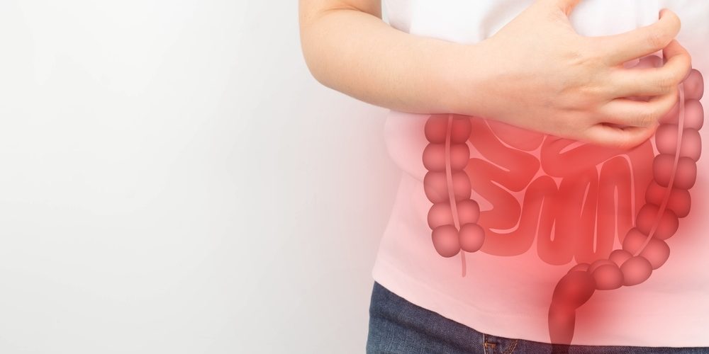 Woman,Suffering,From,Abdominal,Pain,With,Small,And,Large,Intestines