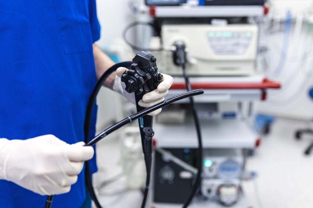 Doctor,Proctologist,Holding,Endoscope,During,Colonoscopy.,Probe,Colonoscope.,Doctor,Gastroenterologist